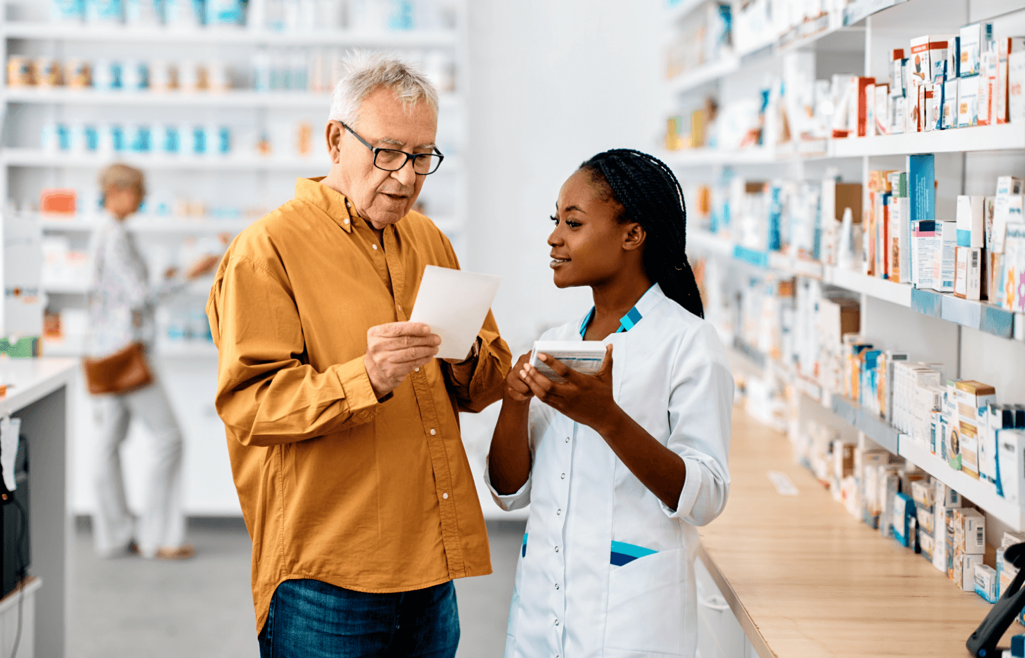 Pharmacist assisting customer