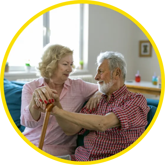 Couple holding hands while sitting
