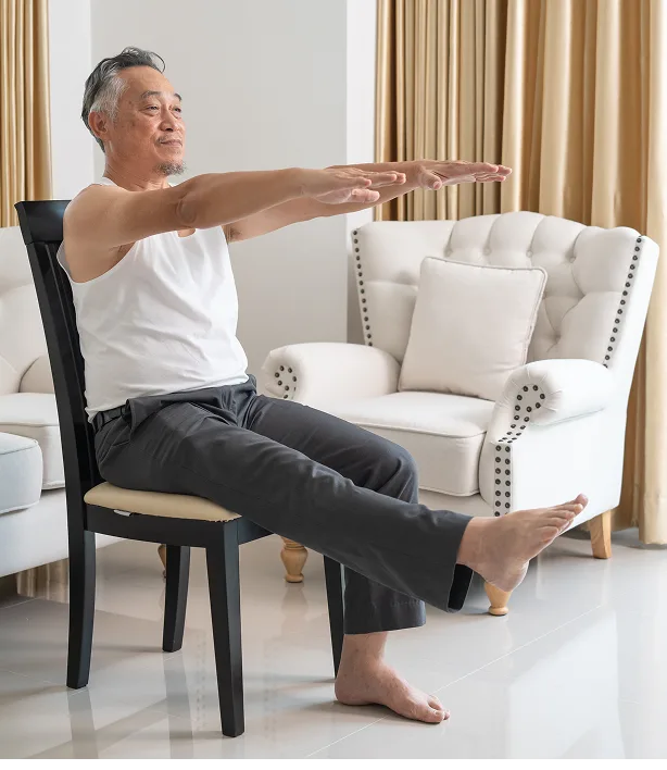 image of an older Aisan man performing stretches while seated