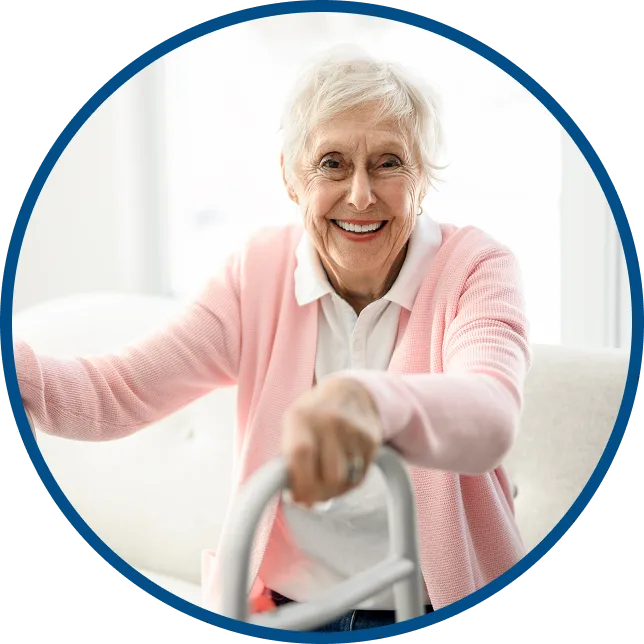 image shows a younger woman walking & supporting an older woman