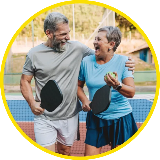 Couple playing pickleball